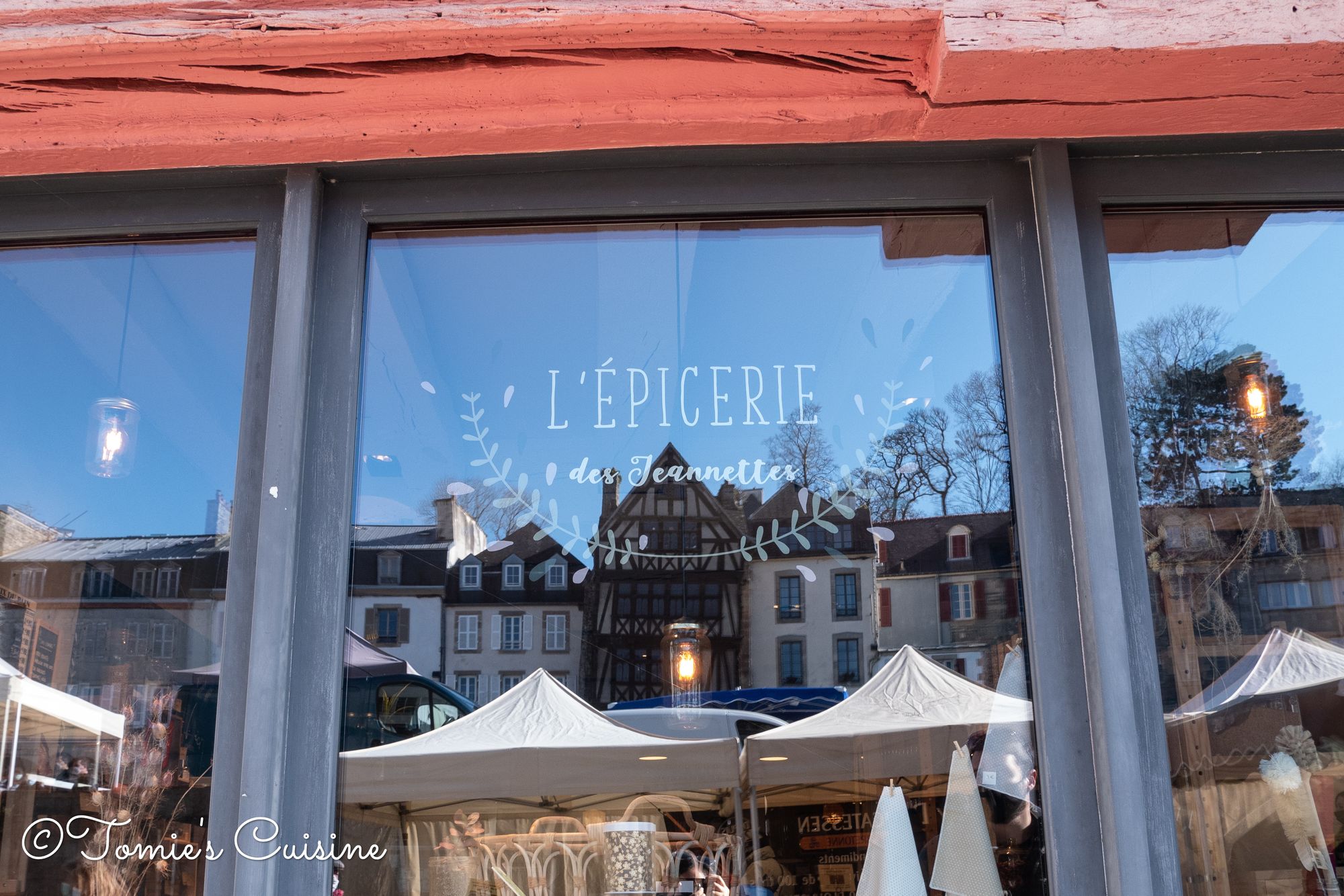 Fruit Stall With People Buying At Morlaix Weekly Market France