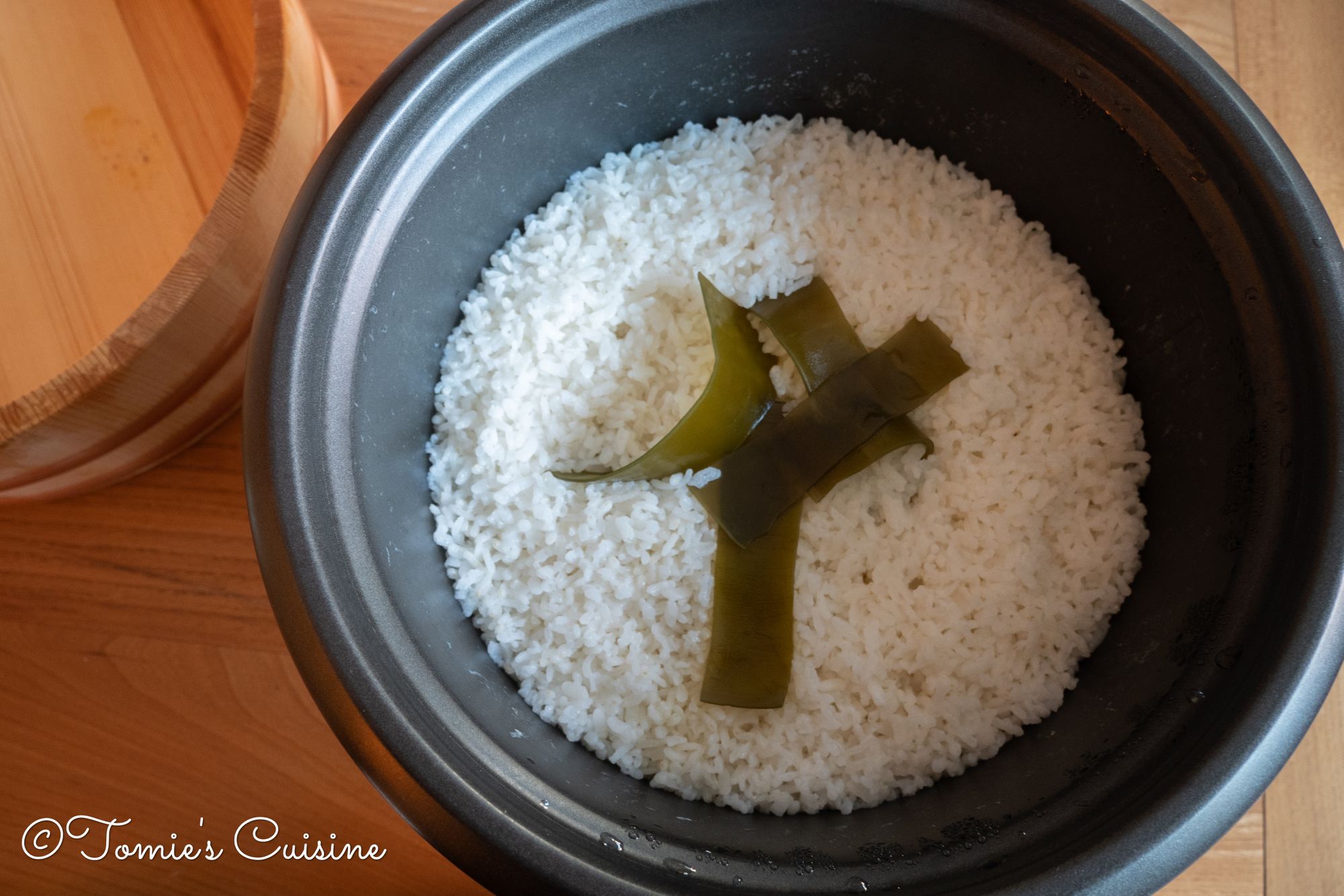 I added dried konbu (kelp) before cooking the rice to give some flavour to it.