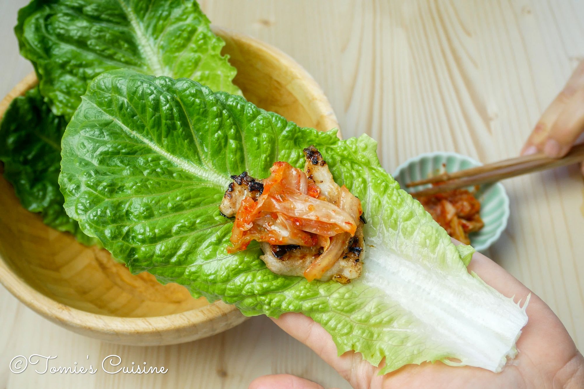 Grilled Shio-koji pork with kimchi and lettuce.